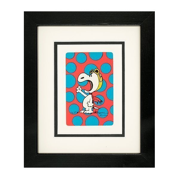 Snoopy shouting. The background is red with blue dots